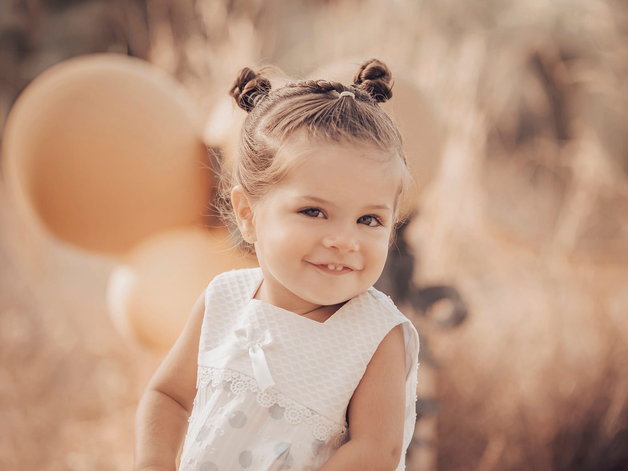 Foto intantil con globos en Málaga